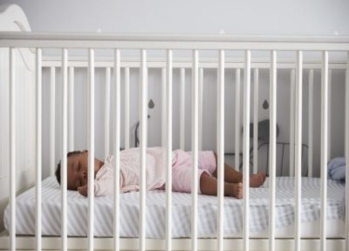 baby to sleep in a crib