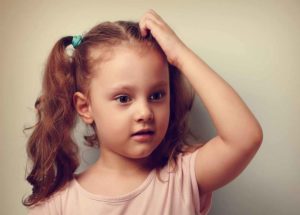 Signs and Symptoms of Dandruff in Kids